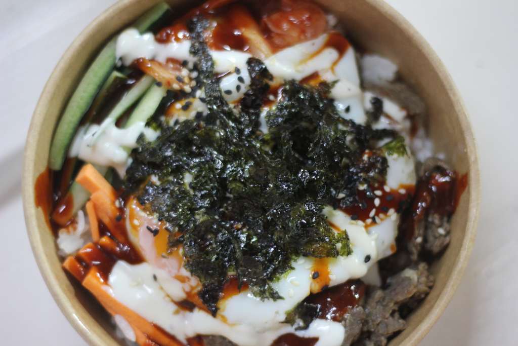 ALT TEXT: Gangnam Bowl bibimbap beef. Photo by Mikaela Bello